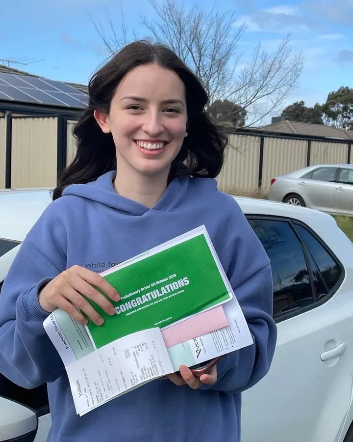 NDIS driving lesson with female instructor and participant in adaptive vehicle