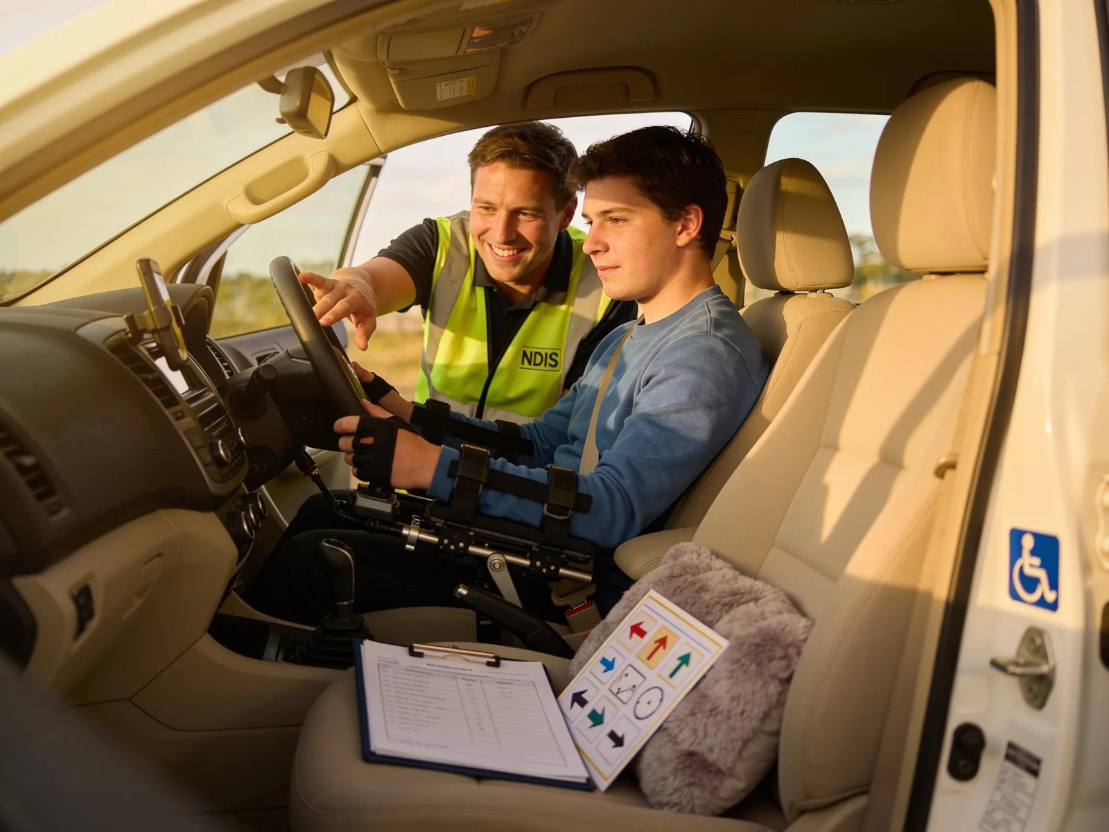 Instructor and learner in an NDIS driving lesson, illustrating supportive instructional strategies